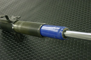 Inserting Cartridge Shock Absorber into Shell Case